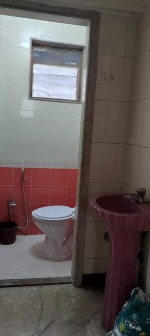 Attached Bathroom in 1 BHK Apartment at Suryodaya Apartments, Seawoods Sector 48 – for Sale
