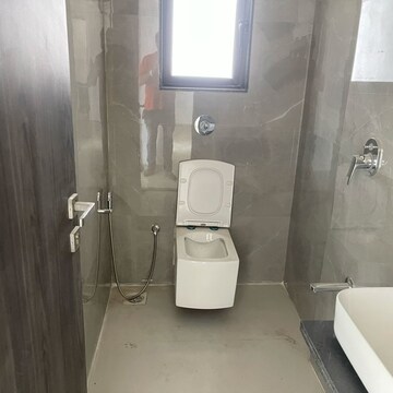 Bathroom in 2 BHK Apartment at Dev Leo Tower, Adarsh Nagar – for Rent