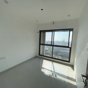 Room in 2 BHK Apartment at Dev Leo Tower, Adarsh Nagar – for Rent