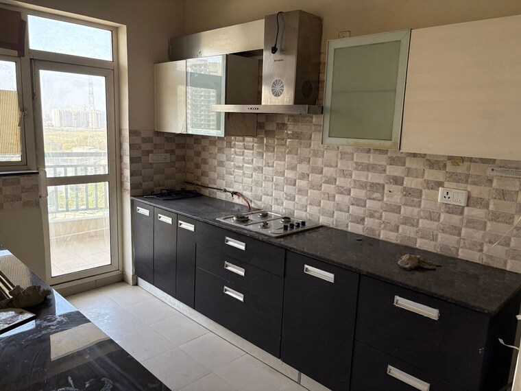 Kitchen, dlf-new-town-heights-i 3 Bedroom 1845 Sq.Ft. Apartment In Sector 90 Gurgaon 10056414