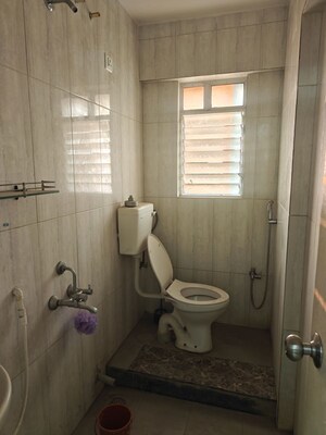 Bathroom in 1 BHK Apartment at Gera Shrishti, Wagholi – for Rent