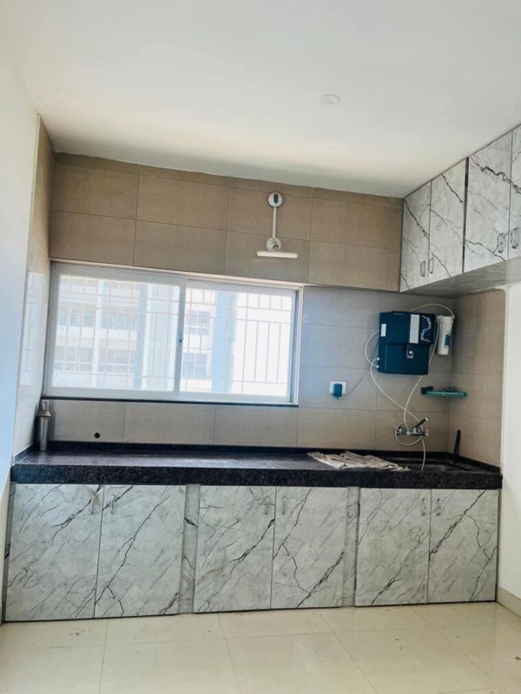 Kitchen, gera-shrishti 1 Bedroom 630 Sq.Ft. Apartment In Wagholi Pune 10056420