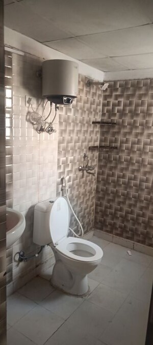 Bathroom in 2 BHK Apartment at Aims Golf City, Sector 75 – for Rent