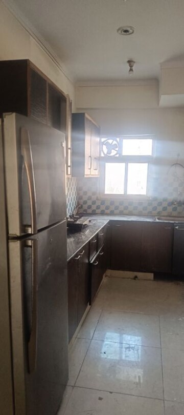 Kitchen in 2 BHK Apartment at Aims Golf City, Sector 75 – for Rent
