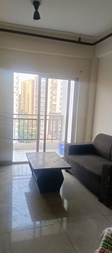 Living Room in 2 BHK Apartment at Aims Golf City, Sector 75 – for Rent