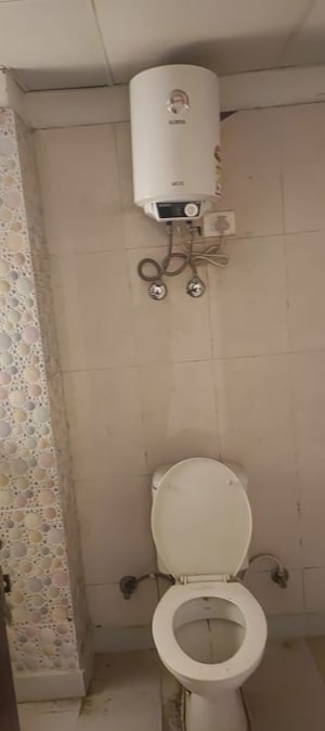 Bathroom in 2 BHK Apartment at Aims Golf City, Sector 75 – for Rent