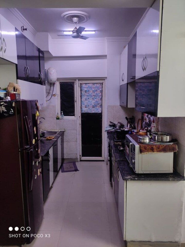Kitchen, aims-golf-city 2 Bedroom 950 Sq.Ft. Apartment In Sector 75 Noida 10056428
