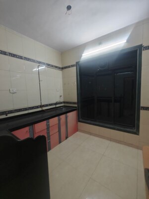 Kitchen in 2 BHK Apartment at Nandidham CHS, Seawoods – for Rent