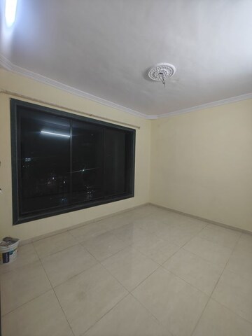 Room in 2 BHK Apartment at Nandidham CHS, Seawoods – for Rent