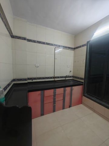 Kitchen in 2 BHK Apartment at Nandidham CHS, Seawoods – for Rent