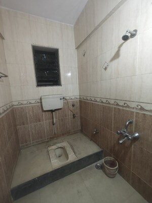 Bathroom in 2 BHK Apartment at Nandidham CHS, Seawoods – for Rent
