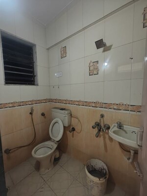 Bathroom in 2 BHK Apartment at Nandidham CHS, Seawoods – for Rent