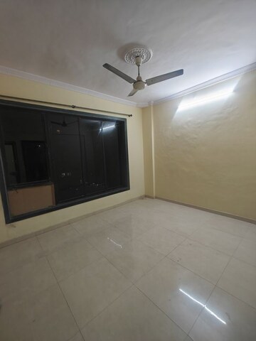 Room in 2 BHK Apartment at Nandidham CHS, Seawoods – for Rent