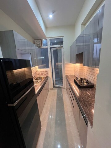 Kitchen in 3 BHK Apartment at Amrapali Crystal Homes, Sector 76 – for Rent