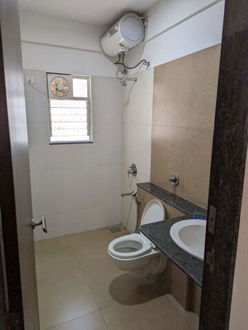 Bathroom in 2 BHK Apartment at Gera Song Of Joy, Kharadi – for Rent