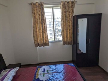 Bedroom in 2 BHK Apartment at Gera Song Of Joy, Kharadi – for Rent