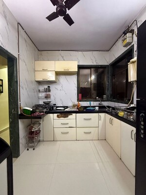 Kitchen in 3 BHK Apartment at Nageshwar Dham Chs, Seawoods – for Rent