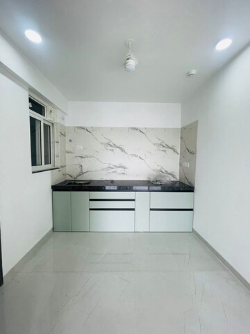 Kitchen in 2 BHK Apartment at Yashwin Orrizonte, Kharadi – for Rent