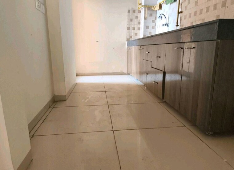 Kitchen, wave-dream-homes 3 Bedroom 1049 Sq.Ft. Apartment In Wave City Ghaziabad 10056459