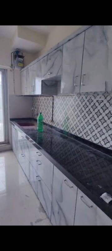 Kitchen in 2 BHK Apartment at Vijay Nakshatra, Ghodbunder Road – for Sale