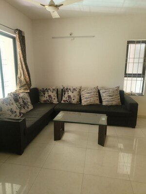 Living Room in 2 BHK Apartment at Tyagi Windwards, Wakad – for Sale