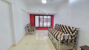 Living Room in 1 BHK Apartment at Abrol Residency, Malad West – for Rent