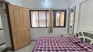 Master Bedroom in 1 BHK Apartment at Jyoti Castle, Malad West – for Rent