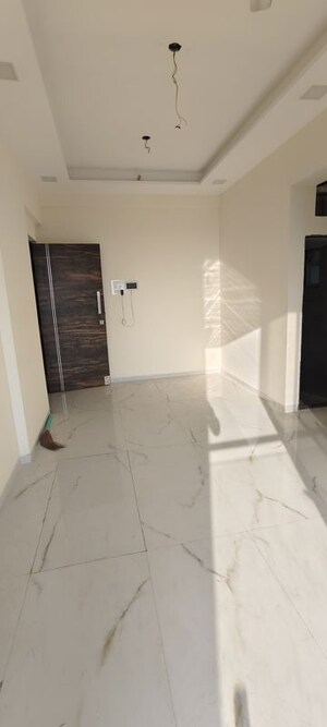 Living Room in 1 BHK Apartment at Amar Vinay Heritage, Mira Road – for Sale