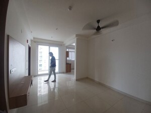 Living Room in 1 BHK Apartment at Brigade Cornerstone Utopia Eden, Varthur – for Rent
