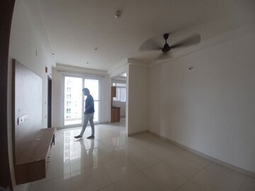 Living Room in 1 BHK Apartment at Brigade Cornerstone Utopia Eden, Varthur – for Rent