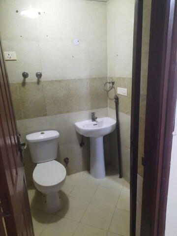 Bathroom in 3 BHK Apartment at Damodar Complex, Sector 37 – for Rent