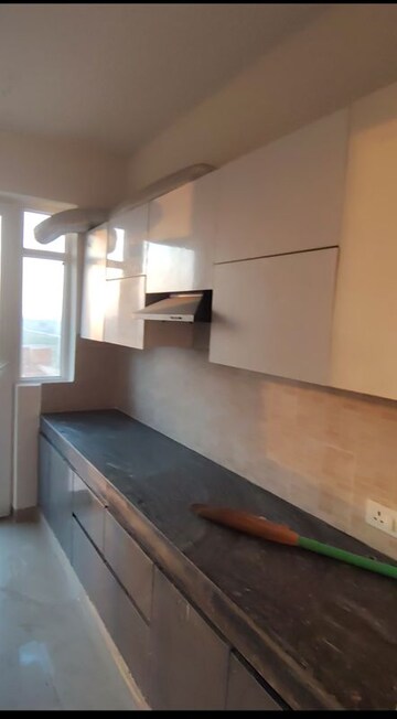 Kitchen in 2 BHK Apartment at Ansal Highland Park, Sector 103 – for Sale