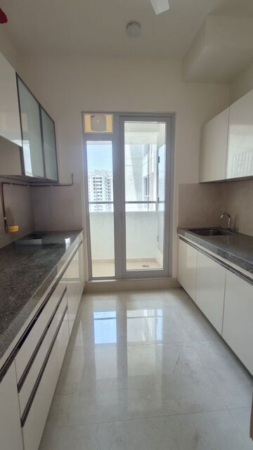 Kitchen in 2 BHK Apartment at Courtyard by Narang Realty and The Wadhwa Group, Pokhran Road No Two – for Rent