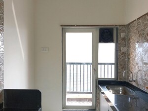 Kitchen in 1 BHK Apartment at Raunak Residency Thane, Pokhran Road No One – for Rent