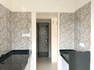 Kitchen in 1 BHK Apartment at Raunak Residency Thane, Pokhran Road No One – for Rent