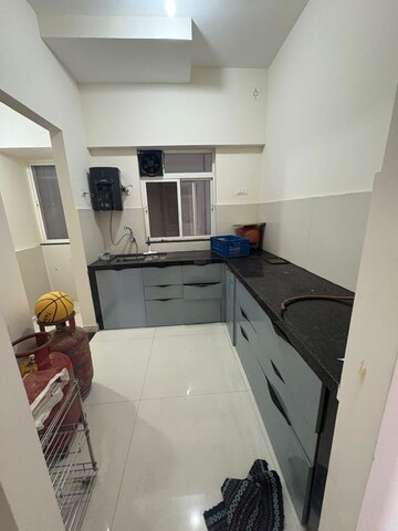 Kitchen in 2 BHK Apartment at Kumar Megapolis Saffron, Hinjewadi – for Rent