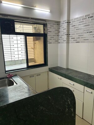 Kitchen in 2 BHK Apartment at NG Park, Dahisar East – for Rent