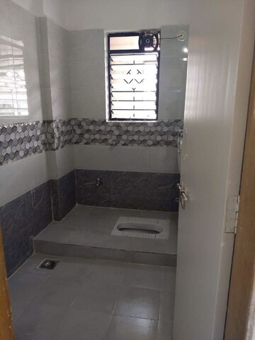 Bathroom in 2 BHK Apartment at Yadav Heights Karve Nagar, Karve Nagar – for Rent