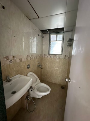 Bathroom in 2 BHK Apartment at Shroff Signature Heights, Wakad – for Rent