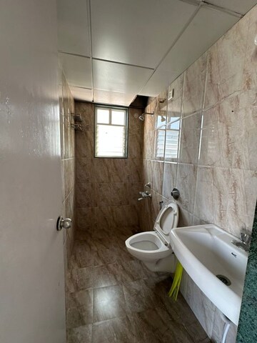 Bathroom in 2 BHK Apartment at Shroff Signature Heights, Wakad – for Rent