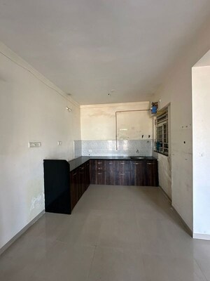 Kitchen in 2 BHK Apartment at Shroff Signature Heights, Wakad – for Rent