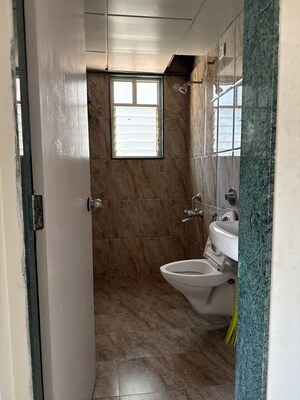 Bathroom in 2 BHK Apartment at Shroff Signature Heights Phase I, Bhagwan Nagar – for Rent