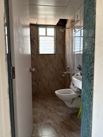 Bathroom in 2 BHK Apartment at Shroff Signature Heights Phase I, Bhagwan Nagar – for Rent