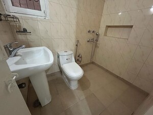 Bathroom in 3 BHK Apartment at Sarita Vihar – for Rent