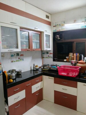 Kitchen in 2 BHK Apartment at Mahavir Square, Manpada – for Rent