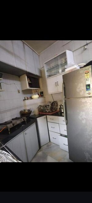 Kitchen in 2 BHK Apartment at Suyog CHS Goregaon West, Goregaon West – for Rent