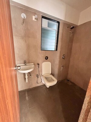 Bathroom in 2 BHK Apartment at Triumph Omkareshwar CHS, Borivali East – for Sale