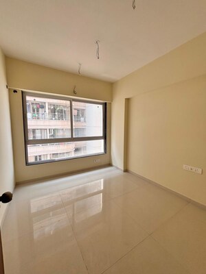 Room in 2 BHK Apartment at Triumph Omkareshwar CHS, Borivali East – for Sale