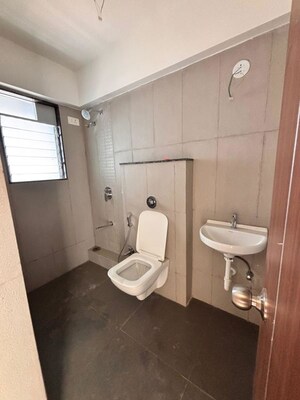 Bathroom in 2 BHK Apartment at Triumph Omkareshwar CHS, Borivali East – for Sale