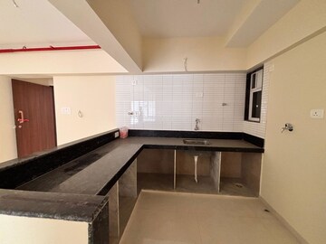 Kitchen in 2 BHK Apartment at Triumph Omkareshwar CHS, Borivali East – for Sale